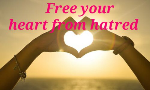 Image Represents Heart Shaped hand with a message heart from hatred